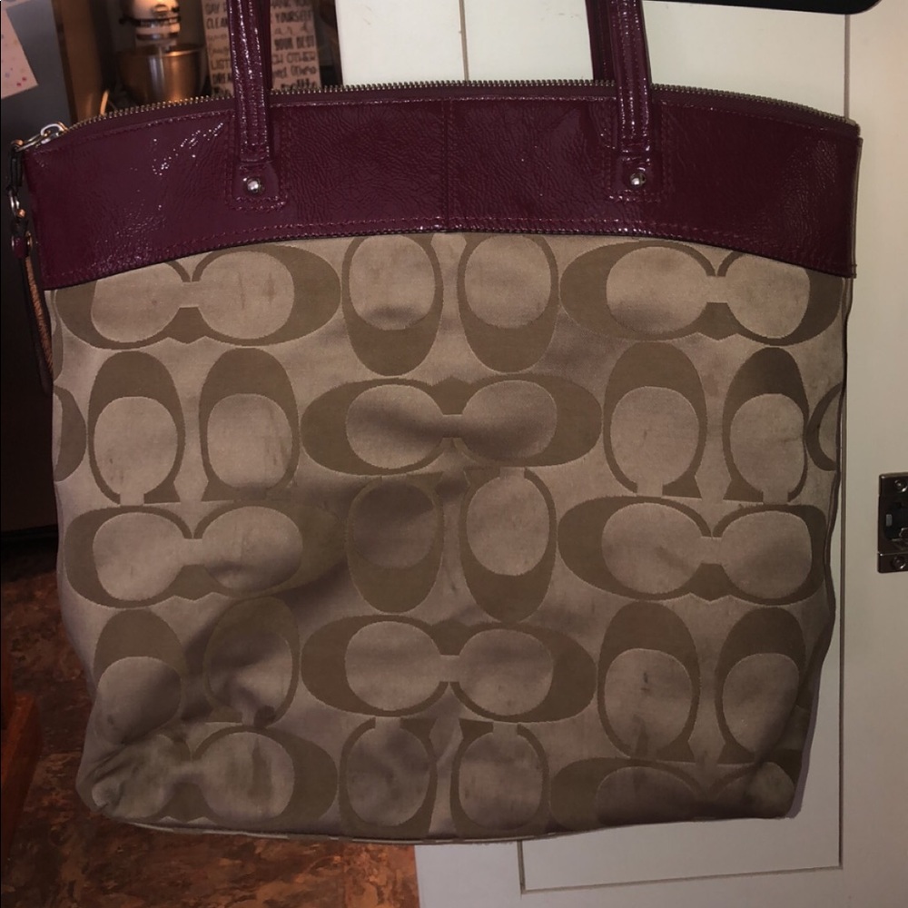 Plum Coach shoulder bag.